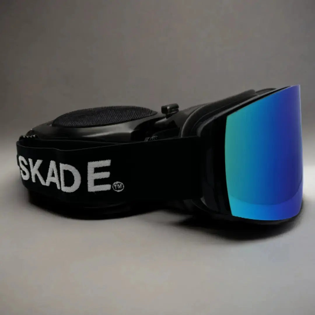 a pair of ski goggles sitting on top of a table