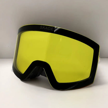 a pair of ski goggles sitting on top of a table